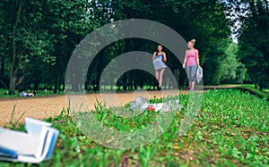 Two girls doing plogging