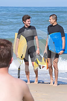 Two girls doing surf in beach