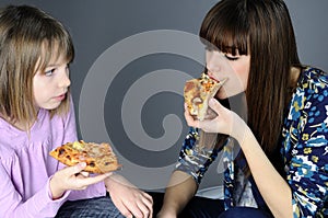 Two girls eating