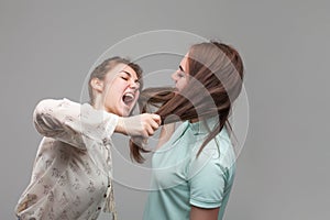 Two girls fighting, women quarrel