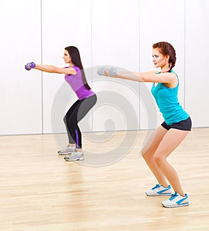 Two girls at fitness club
