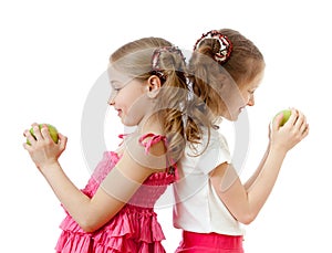 Two girls with green apple healthy food
