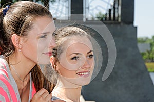 Two girls have a rest after exercising