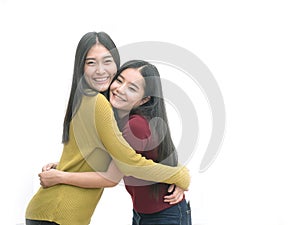 Two girls hugging each others