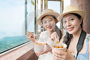 Two girls love famous Taiwanese local food
