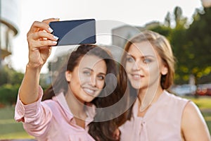 Two girls making selfie