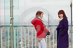 Two girls on the observation platform of Montparnasse tower