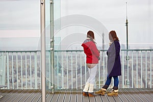 Two girls on the observation platform of Montparnasse tower