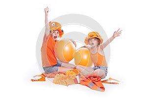 Two girls in orange cheer