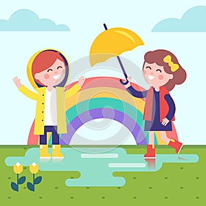 Two girls playing in the rain and rainbow