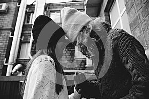 Two girls playing in the street together