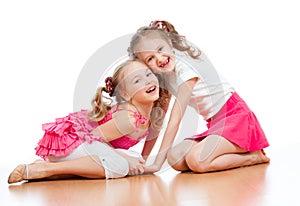 Two girls are playing together