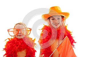 Two girls posing in orange outfit