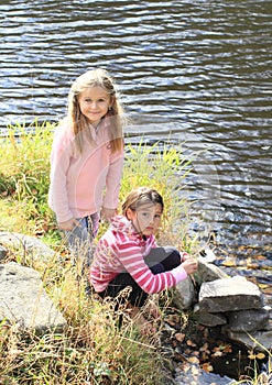 Two girls by the river