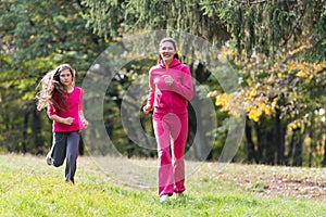 Two girls running