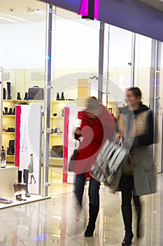 Two girls in shopping center