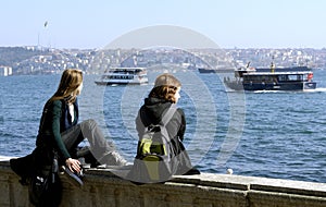 Two girls are sitting in Istanbul