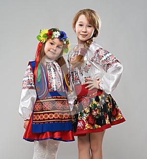 Two girls in Slavic folk costumes