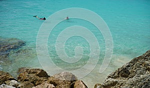 Two girls snorkeling at the Grote Knip at Curacao