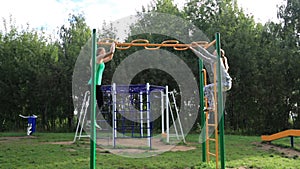 Two girls on sports ground.