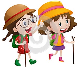 Two girls with stick and backpack go hiking