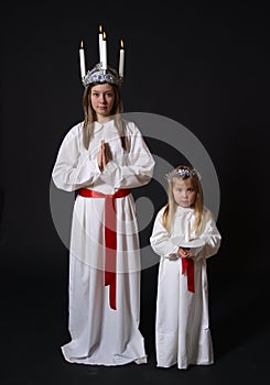 Two girls in white robes photo