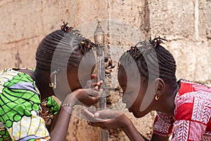 Two Girls Women drink Fresh Water to be healthy
