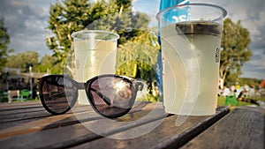 Two glass of citronade on table photo