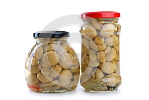 Two glass jars with marinated champignons