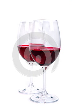 Two glass of red wine on a white background photo
