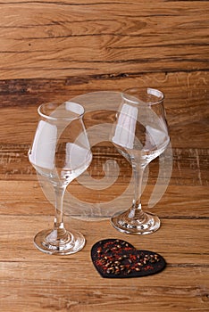 Two glasses of beer for lovers. Octoberfest. Valentines day. Happy couple concept. Bright red background.