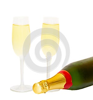 Two glasses of champagne with bottle