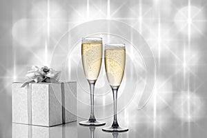Two glasses of champagne on a festive beautiful background