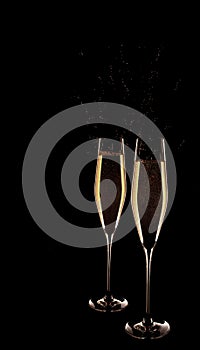 Two glasses of champagne isolated on black background