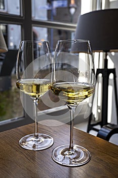 Two glasses of Chilean Chardonnay Viognier white wine served in cosy Dutch restaurant