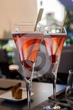 two glasses of cocktail beverages at the restaurant terrace in outdoor