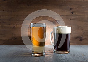 Two glasses of different colored beer