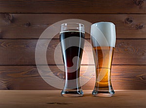 Two glasses of different colored beer