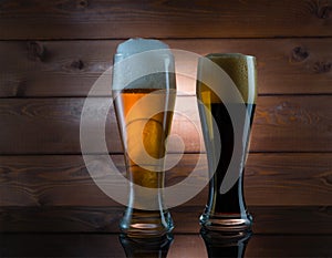 Two glasses of different colored beer