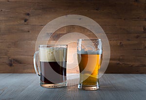 Two glasses of different colored beer