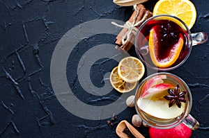 Two glasses of different type of mulled wine