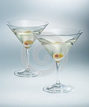 Two glasses martini with olive. cocktail isolated. photo