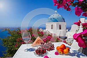 Two glasses of red wine and fruit