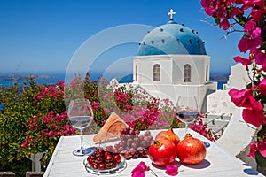 Two glasses of red wine and fruit