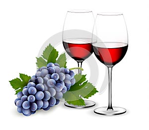 Two glasses of red wine with grapes.