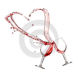 Two glasses of red wine with heart splash
