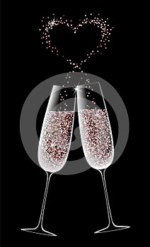 Two glasses of sparkling champagne on a black background.