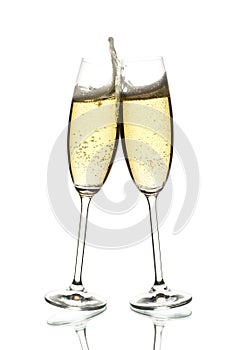 Two glasses of sparkling wine clinking photo