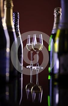 Two glasses of sparkling wine for coffee bottles.beautiful photo of alcohol