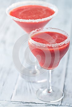 Two glasses of strawberry margarita cocktail